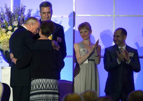 Leah Hogsten  |  The Salt Lake Tribune
Jon Huntsman hugs Dorothy Johnson after she was awarded the Mark Huntsman Award, in honor of Huntsman's son, Mark Huntsman.  Dorothy Johnson, one of 11 winners of the 2016 Huntsman Award for Excellence in Education, is honored Friday evening at the Little America Hotel by philanthropists Jon and Karen Huntsman. Johnson has been an exemplary special education teacher at Manti Elementary for 15 years.  Johnson teaches and manages students with mild/moderate learning disabilities in this Title 1 School in rural Utah and the needs of her students have driven her professional 
development focus.


Photo taken Wednesday, May 11, 2016.