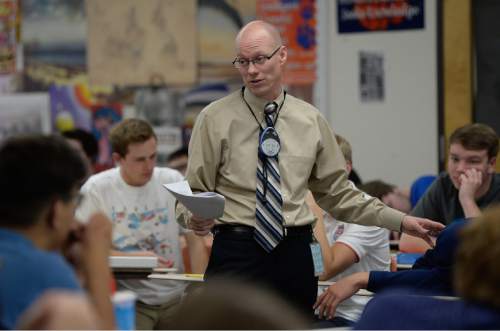 Francisco Kjolseth | The Salt Lake Tribune 
Brighton High School teacher Aaron Hadfield describes a foreign policy simulation assignment to his American Problems class recently. Hadfield is one of this year's winners of the annual Huntsman Awards for Excellence in Education.