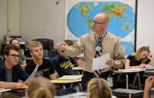 Francisco Kjolseth | The Salt Lake Tribune 
Brighton High School teacher Aaron Hadfield describes a foreign policy simulation assignment to his American Problems class recently. Hadfield is one of this year's winners of the annual Huntsman Awards for Excellence in Education.