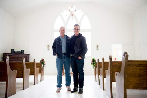 Jeremy Harmon  |  The Salt Lake Tribune
Reed Cowan and his father, Russell Cowan, stand in the chapel of the 100-year-old Myton Community Presbyterian Church in Myton, Utah, on Saturday, April 30, 2016. Reed, who is a news anchor in Las Vegas, purchased the church in December 2015 with plans to renovate it into a second home but has instead decided to make the church available for weddings and other community events.
