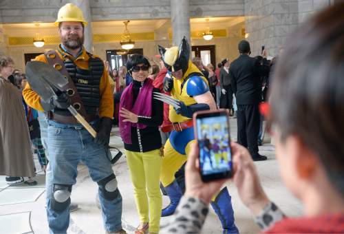 Al Hartmann  |  The Salt Lake Tribune
A tourist taking a look around the Utah State Capitol on Wednesday, May 11, is delighted to have her picture taken with cosplayers there for the announcement of Salt Lake Comic Con's celebrity guests for the 2016 edition, set for Sept. 1-3 at the Salt Palace Convention Center.