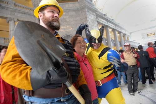 Al Hartmann  |  The Salt Lake Tribune
A tourist taking a look around the Utah State Capitol on Wednesday is delighted to have her picture taken with cosplayers there for the announcement of Salt Lake Comic Con's celebrity guests for the 2016 edition, set for Sept. 1-3 at the Salt Palace Convention Center.