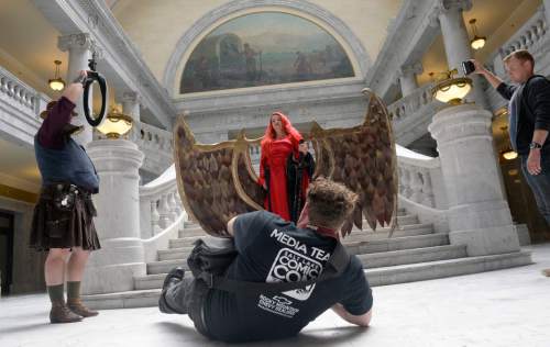 Al Hartmann  |  The Salt Lake Tribune
Cosplayer Capi Love poses for a photo at the Utah State Capitol on Wednesday, May 11. Her costume is a combination of characters from past   cons.