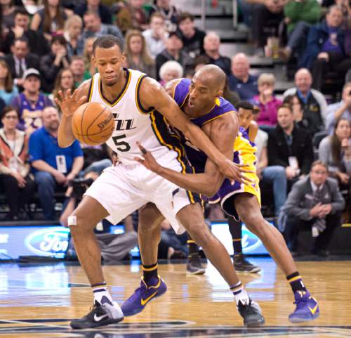 Lennie Mahler  |  The Salt Lake Tribune

Rodney Hood is guarded by Kobe Bryant as the clock runs out in the first half of a game between the Utah Jazz and Los Angeles Lakers at Vivint Smart Home Arena in Salt Lake City, Monday, March 28, 2016.