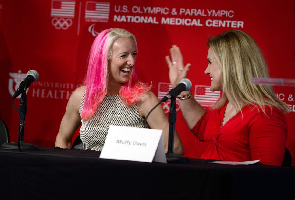 Scott Sommerdorf   |  The Salt Lake Tribune  
Olympic athlete Shannon Bahrke, left and Paralympic athlete Muffy Davis, right, talk prior to a press conference where leaders of the University of Utah, the United States Olympic Committee (USOC) and Salt Lake City joined with Olympic and Paralympic athletes to celebrate a special joint announcement, Wednesday, May 11, 2016.