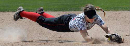 Steve Griffin / The Salt Lake Tribune

Manti shortstop Mikaela Cox makes a diving stop on a hard grounder during 2A softball state tournament semifinal game against Enterprise in Spanish Fork, Utah Spanish Fork Friday May 13, 2016.