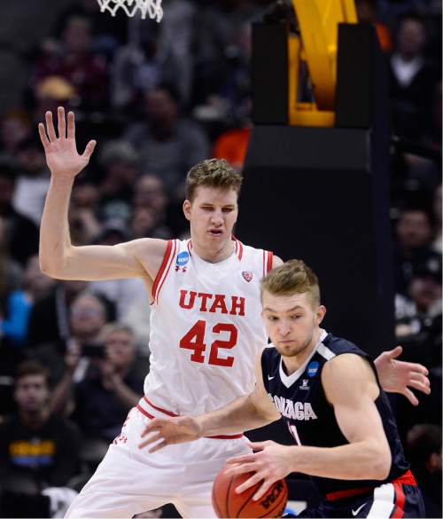 Scott Sommerdorf   |  The Salt Lake Tribune  
Utah F Jakob Poeltl (42) tries to defend against Gonzaga F Domantas Sabonis (11) during second half play. Gonzaga beat Utah 82-59 in Denver, Saturday, March 19, 2016.