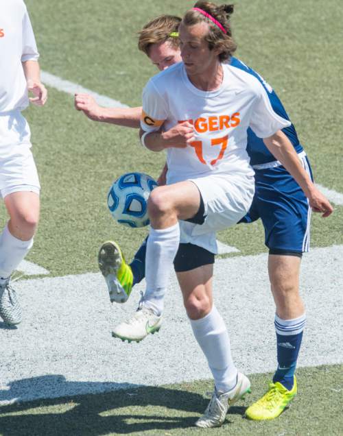 Chris Detrick  |  The Salt Lake Tribune
Wasatch Academy's Eli Fischberg-Robinson (17) and Waterford's Patrick Dowd (27) go for the ball during the 3A championship game at Alta High School Saturday May 14, 2016. Waterford defeated Wasatch Academy 6-0.