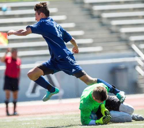 Chris Detrick  |  The Salt Lake Tribune
Snow Canyon's Quinn Hargis (98) makes a save on Juan Diego's Michael DiGeronimo (13) during the 3A championship game at Alta High School Saturday May 14, 2016.