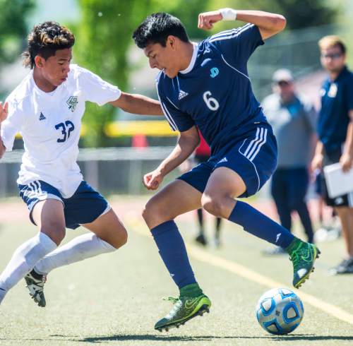 Chris Detrick  |  The Salt Lake Tribune
Snow Canyon's Kevin Chillin (32) and Juan Diego's Gus Flores (6) go for the ball during the 3A championship game at Alta High School Saturday May 14, 2016.