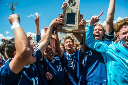 Chris Detrick  |  The Salt Lake Tribune
Members of the Juan Diego soccer team celebrate after winning the 3A championship game at Alta High School Saturday May 14, 2016. Juan Diego defeating Snow Canyon 1-0.