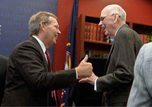 Al Hartmann  |  The Salt Lake Tribune
Three-time Governor of Utah Mike Leavitt, left, greets his good friend and mentor, former Senator Bob Bennett Wednesday Jan. 27 at the University of Utah where the Hinckley Institute of Politics inducted Bennett into the Hinckley Hall of Fame.