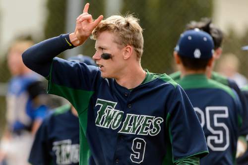 Trent Nelson  |  The Salt Lake Tribune
Timpanogos's Andrew Lopez celebrates a score vs. Orem in a critical Region 7 baseball game in Orem, Wednesday April 27, 2016. The two teams have combined to win 28 straight games.