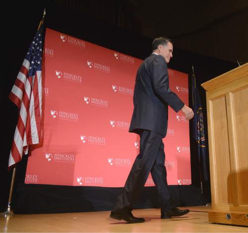 Al Hartmann  |  The Salt Lake Tribune
Former presidential candidate Mitt Romney walks across stage at Libby Gardner Hall to make a speech about the state of the 2016 presidential race and Donald Trump at the Hinckley Insitute of Politics at the University of Utah Thursday March 3.