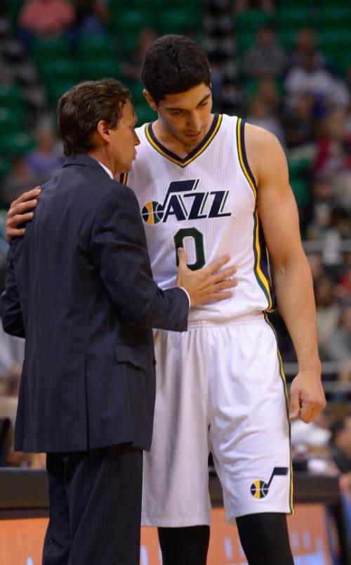 Leah Hogsten  |  The Salt Lake Tribune
Utah Jazz head coach Quin Snyder talks with Utah Jazz center Enes Kanter (0) as he comes off the court during Tuesdays, October 7, 2014 preseason opener at Energy Solutions Arena.