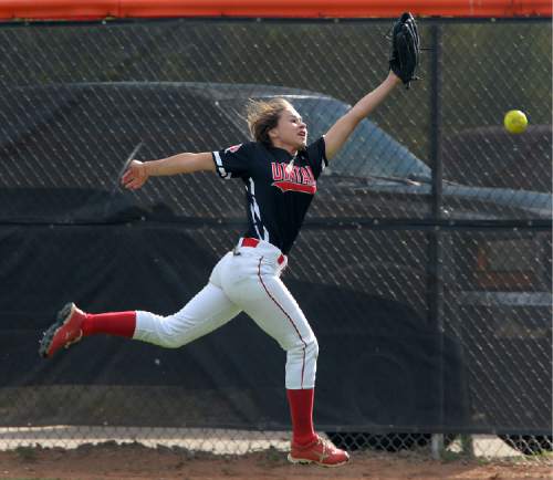 Steve Griffin / The Salt Lake Tribune

Uintah centerfielder Jacee Murray stretches for a long fly ball doing the first round of the Class 4A softball tournament against Murray in Murray Tuesday May 17, 2016.