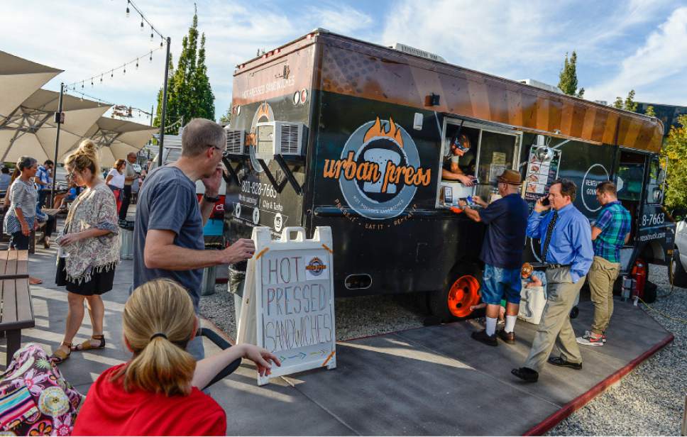 Francisco Kjolseth | The Salt Lake Tribune
The Urban Press Food Truck joins the pack of food trucks parked at the Soho Food Park in Holladay earlier this year.