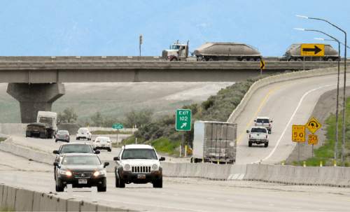 Trent Nelson  |  The Salt Lake Tribune
Traffic at the intersection of I-80 and SR201 on the west end of Salt Lake County, Tuesday May 17, 2016. Utah highway officials are considering an extension of SR201 past where it now ends and merges with I-80 to open up an alternative west-east route. Currently a bad crash or weather can close I-80.