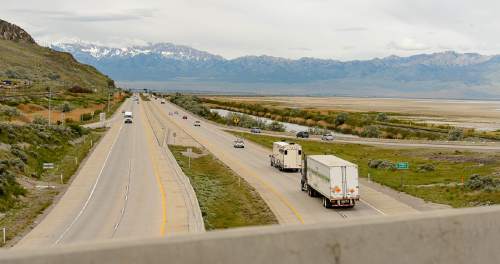 Trent Nelson  |  The Salt Lake Tribune
Traffic at the intersection of I-80 and SR201 on the west end of Salt Lake County, Tuesday May 17, 2016. Utah highway officials are considering an extension of SR201 past where it now ends and merges with I-80 to open up an alternative west-east route. Currently a bad crash or weather can close I-80.