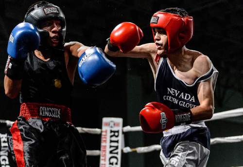 Trent Nelson  |  The Salt Lake Tribune
Saul Gomez, Nevada, vs. Codey Bermoy, Hawaii, in boxing action at the Golden Gloves of America's 2016 National Tournament of Champions in Salt Lake City, Wednesday May 18, 2016.