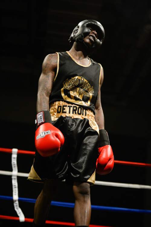 Francisco Kjolseth | The Salt Lake Tribune
Davion Wilkes of Detroit shows his disappointment after his fight was stopped when he dislocated his shoulder but was able to settle it back in, during the first round of the Golden Gloves boxing tournament at the Salt Palace Convention Center on Monday, May 16, 2016.