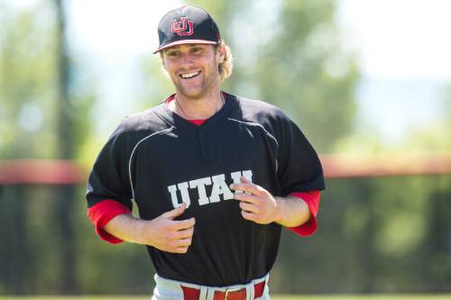 Chris Detrick  |  The Salt Lake Tribune
University of Utah baseball player Hunter Simmons warms up during a practice Wednesday May 11, 2016.