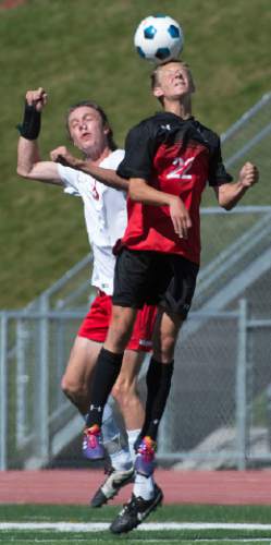 Steve Griffin / The Salt Lake Tribune

Alta's Jack Anderson heads the ball away from East's David Hill during the first-round 4A boys' soccer tournament game between Alta and East at East High School in Salt Lake City Wednesday May 18, 2016.