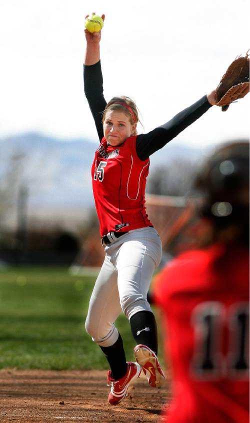 Scott Sommerdorf  |  The Salt Lake Tribune
           
At 6-0, Weber High pitcher McKenna Bull is the biggest reason for the team's success. She warms up prior to Weber's game at Woods Cross, Friday, March 30, 2012.