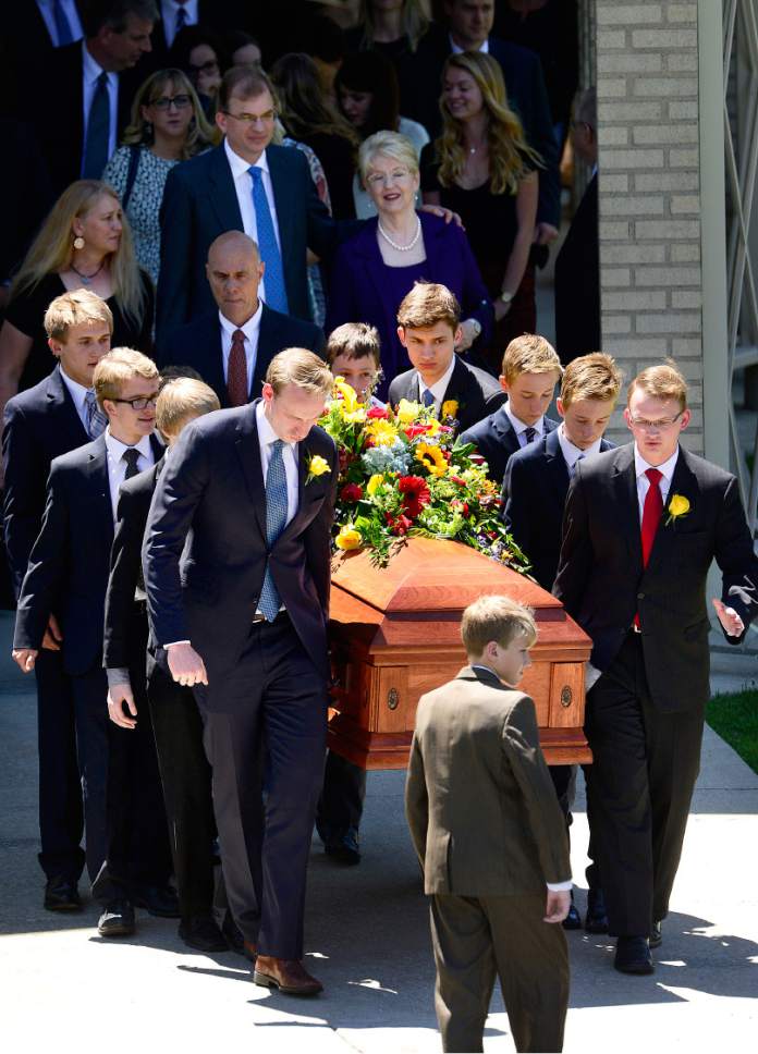 Scott Sommerdorf   |  The Salt Lake Tribune  
Family members follow, as former U.S. Senator Bob Bennett's casket is taken from the Federal Heights Ward Chapel for it's short trip to interment services at the Salt Lake City Cemetery, Saturday, May 14, 2016.