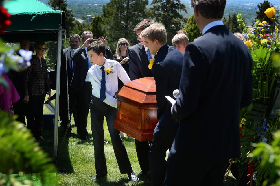 Scott Sommerdorf   |  The Salt Lake Tribune  
Former U.S. Senator Bob Bennet's casket is brought to the interment service by pall bearers at the Salt Lake City Cemetery, Saturday, May 14, 2016.