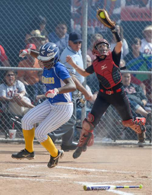 Francisco Kjolseth | The Salt Lake Tribune
Taylorsville's Jazmyn Rollin beats West High catcher Aubrey Smith to the home plate in the quarterfinals of the Class 5A softball tournament at West on Thursday, May 19, 2016.