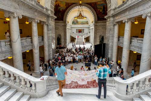Trent Nelson  |  The Salt Lake Tribune
Utah Diné Bikéyah (UDB) and Tribal leaders stand in support of protecting the Bears Ears at a rally today in the Utah State Capitol Rotunda in Salt Lake City, Wednesday May 18, 2016. Attendees at the rally called for President Obama to protect sacred sites and honor ancestral lands by designating Bears Ears National Monument.