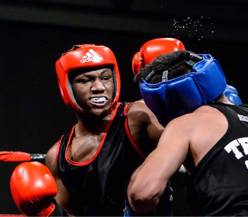 Trent Nelson  |  The Salt Lake Tribune
E'mond Driver, Indiana (red), vs. Rafael Medina, Texas, in boxing action at the Golden Gloves of America's 2016 National Tournament of Champions in Salt Lake City, Thursday May 19, 2016.