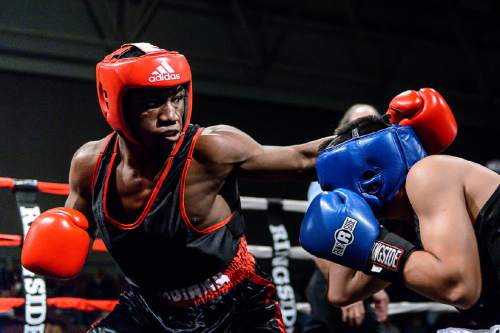 Trent Nelson  |  The Salt Lake Tribune
E'mond Driver, Indiana (red), vs. Rafael Medina, Texas, in boxing action at the Golden Gloves of America's 2016 National Tournament of Champions in Salt Lake City, Thursday May 19, 2016.