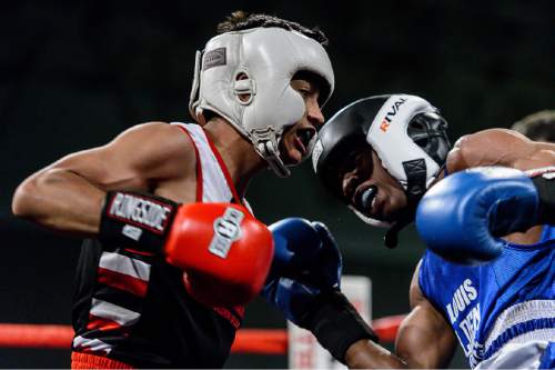 Trent Nelson  |  The Salt Lake Tribune
Diego Alvarez, Rocky Mountain (red), defeats Timothy Jarman, St. Louis, in boxing action at the Golden Gloves of America's 2016 National Tournament of Champions in Salt Lake City, Thursday May 19, 2016.