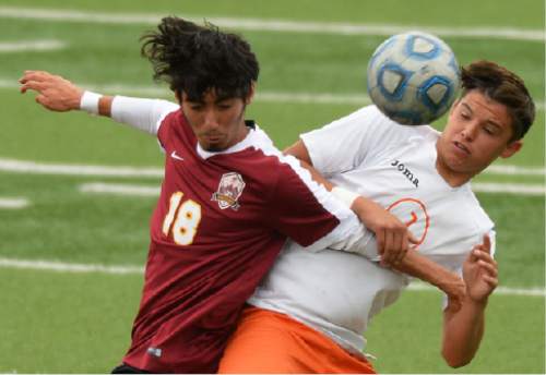 Steve Griffin / The Salt Lake Tribune

Mountain View's Elder Aguayo and Murray's CJ Sanchez fight for the ball during the 4A boys' soccer quarterfinals in Murray Friday May 20, 2016.