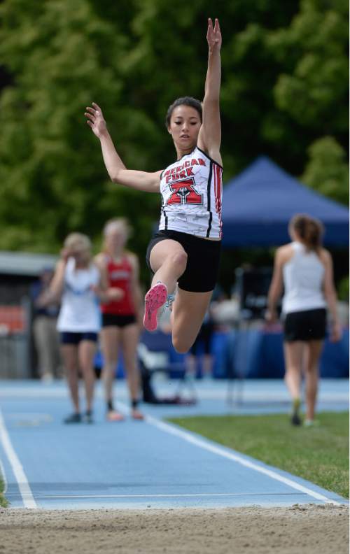Francisco Kjolseth | The Salt Lake Tribune
Emma Aldred of American Fork soars through the air in the Girl's long jump 5A final, as boys and girls high school athletes compete in the 5A-1A state track & field meet compete at BYU in Provo on Friday, May 20, 2016.
