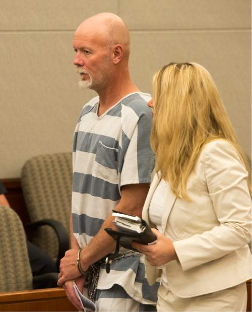Rick Egan  |  The Salt Lake Tribune

Flint Wayne Harrison exits the courtroom with his attorney, Susanne Gustin, as he makes his initial court appearances kidnapping charges at the Farmington Courthouse, Monday, May 23, 2016.