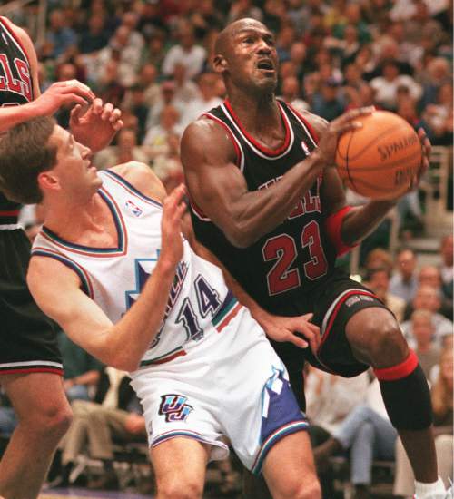 Al Hartmann  |  Tribune file photo

Michael Jordan goes around Jeff Hornacek during the 1997 NBA Finals.