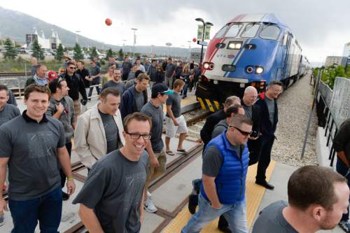 Francisco Kjolseth | The Salt Lake Tribune
Tech company InMoment breaks ground on new headquarters, said to be a first-of-its-kind urban transit oriented development in South Jordan, as around 100 workers arrived via FrontRunner train to the event.