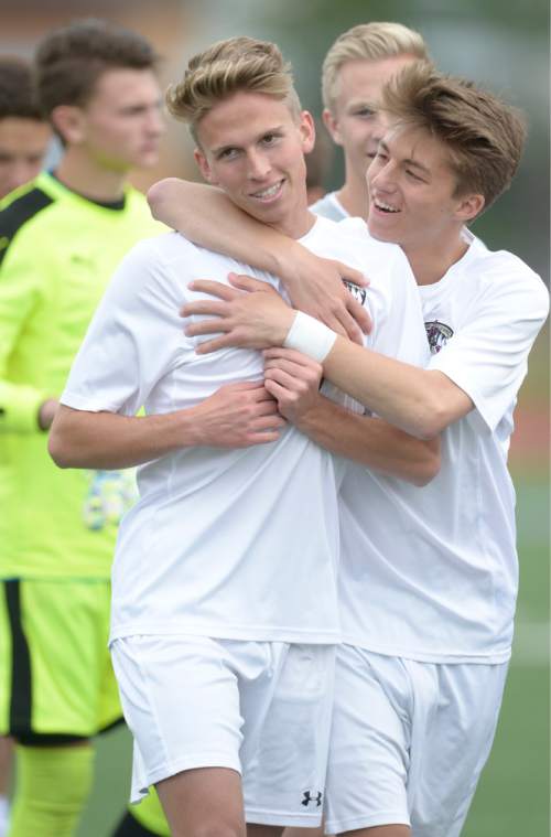 Leah Hogsten  |  The Salt Lake Tribune
Lone Peak's David Airmet celebrates teammate Justin Jones' goal at the half. Viewmont High School defeated Lone Peak High School in a 4-2 sudden death match for the 5A State Soccer semifinal win at Woods Cross High School, May 24, 2016.