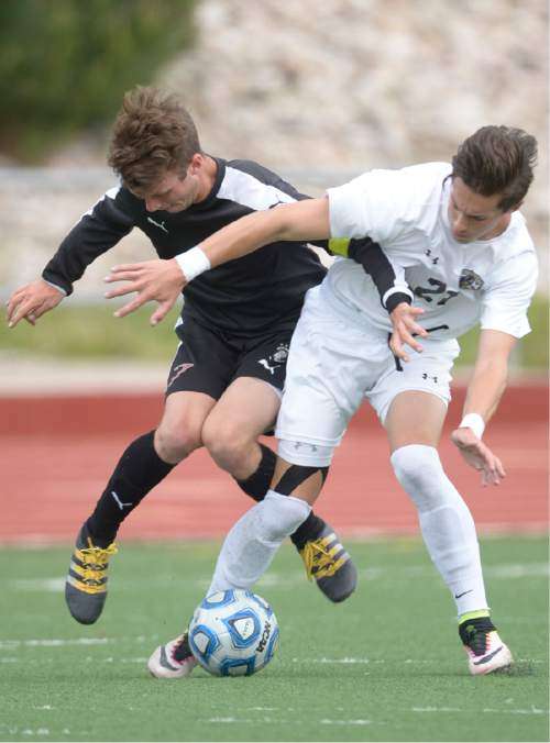 Leah Hogsten  |  The Salt Lake Tribune
Lone Peak's Tyler Gundred and Viewmont's Jack Fox battle for the ball. Viewmont High School defeated Lone Peak High School in a 4-2 sudden death match for the 5A State Soccer semifinal win at Woods Cross High School, May 24, 2016.