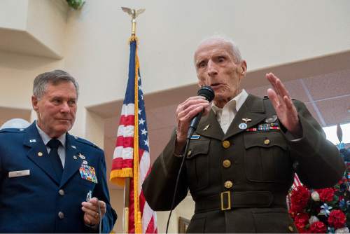 Trent Nelson  |  The Salt Lake Tribune
1st Lieutenant Dan M. Eastman (a 96 year old veteran of WWII) honors his fellow veterans after receiving the Honor Salute at the Olympus Ranch Retirement Community in Murray, Wednesday May 25, 2016. At left is Lieutenant Colonel Robert King (retired).