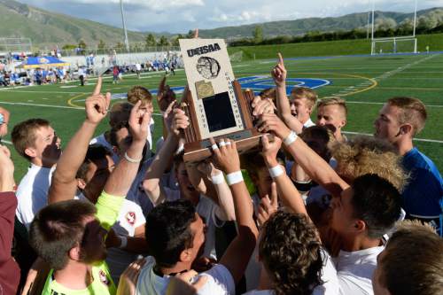 Francisco Kjolseth | The Salt Lake Tribune
Maple Mountain celebrates their win over Orem with a final score of 1-0 in the Class 4A boys' soccer championship.