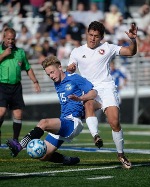Francisco Kjolseth | The Salt Lake Tribune
Orem's Dylan Verbanatz, left, battles Josh Aram of Maple Mountain in game action in Draper for the Class 4A boys' soccer championship.