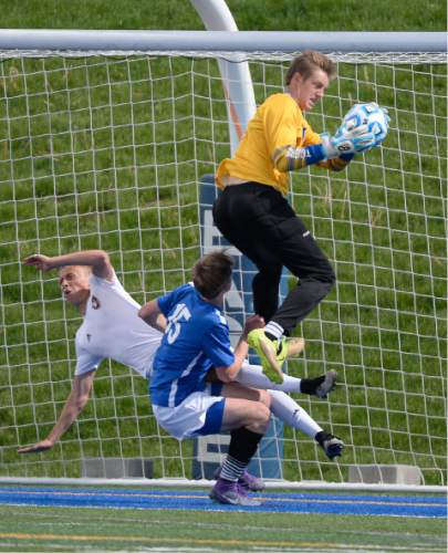 Francisco Kjolseth | The Salt Lake Tribune
Orem battles Maple Mountain in game action in Draper for the Class 4A boys' soccer championship.