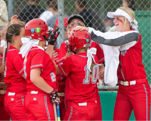 Rick Egan  |  The Salt Lake Tribune

Spanish Fork Dons  congratulate Brylee Rudd (10) after she hit a home run, as Spanish Fork beat Maple Mountain, in the prep 4A semi-finals,  in West Jordan, Wednesday, May 25, 2016.