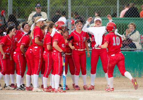 Rick Egan  |  The Salt Lake Tribune

Spanish Fork Dons  congratulate Brylee Rudd (10) after she hit a home run, as Spanish Fork beat Maple Mountain, in the prep 4A semi-finals,  in West Jordan, Wednesday, May 25, 2016.