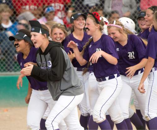 Rick Egan  |  The Salt Lake Tribune

Riverton Silverwolves head back to the dug ouit after the home run by Katie Adler (5) gives the Silverwolves a 10-9 lead in the 7th inning, in their comeback win over the West Panthers, in the prep 5A semi-finals in West Jordan, Wednesday, May 25, 2016.