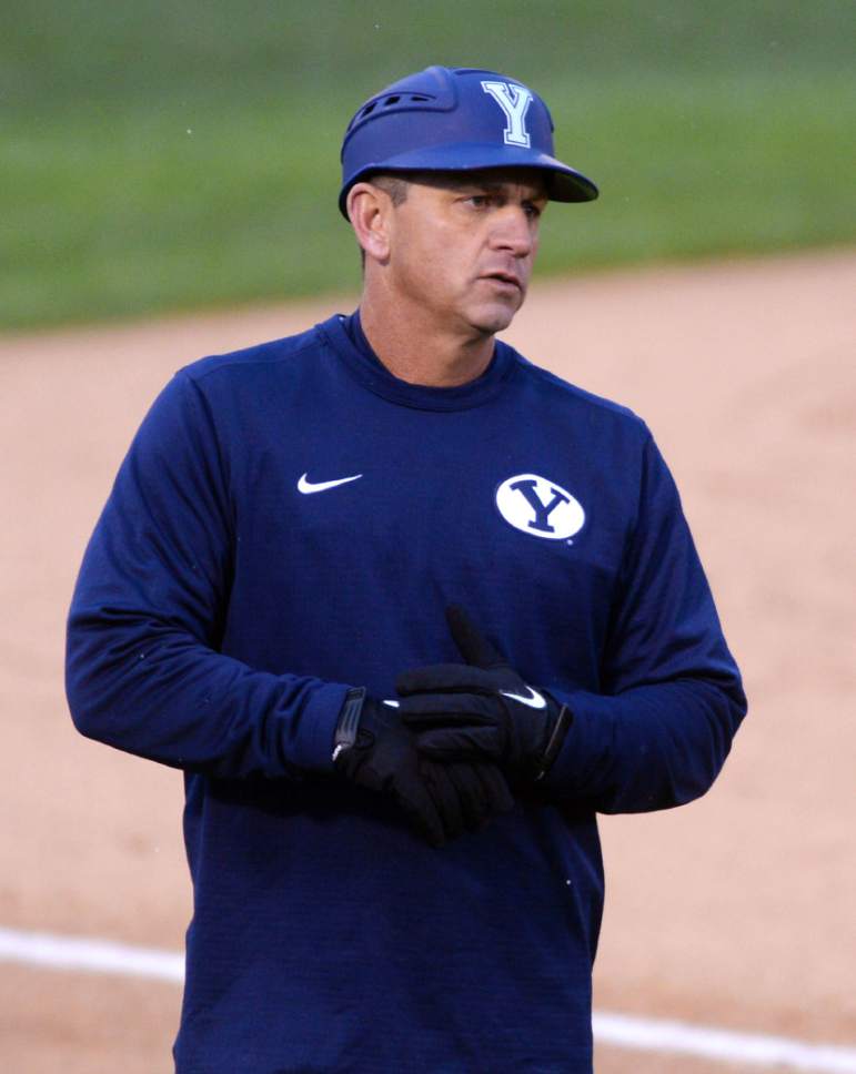 Steve Griffin  |  The Salt Lake Tribune


BYU baseball coach Mike Littlewood coaches from third during game against Utah in at Miller Park on the campus of BYU in Provo, Tuesday, March 15, 2016.